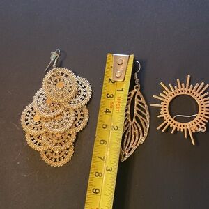 3 pair costume jewelry earrings in gold tone.
